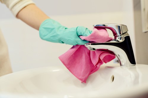 Professional upholstery cleaning service for a sofa in a Westminster home